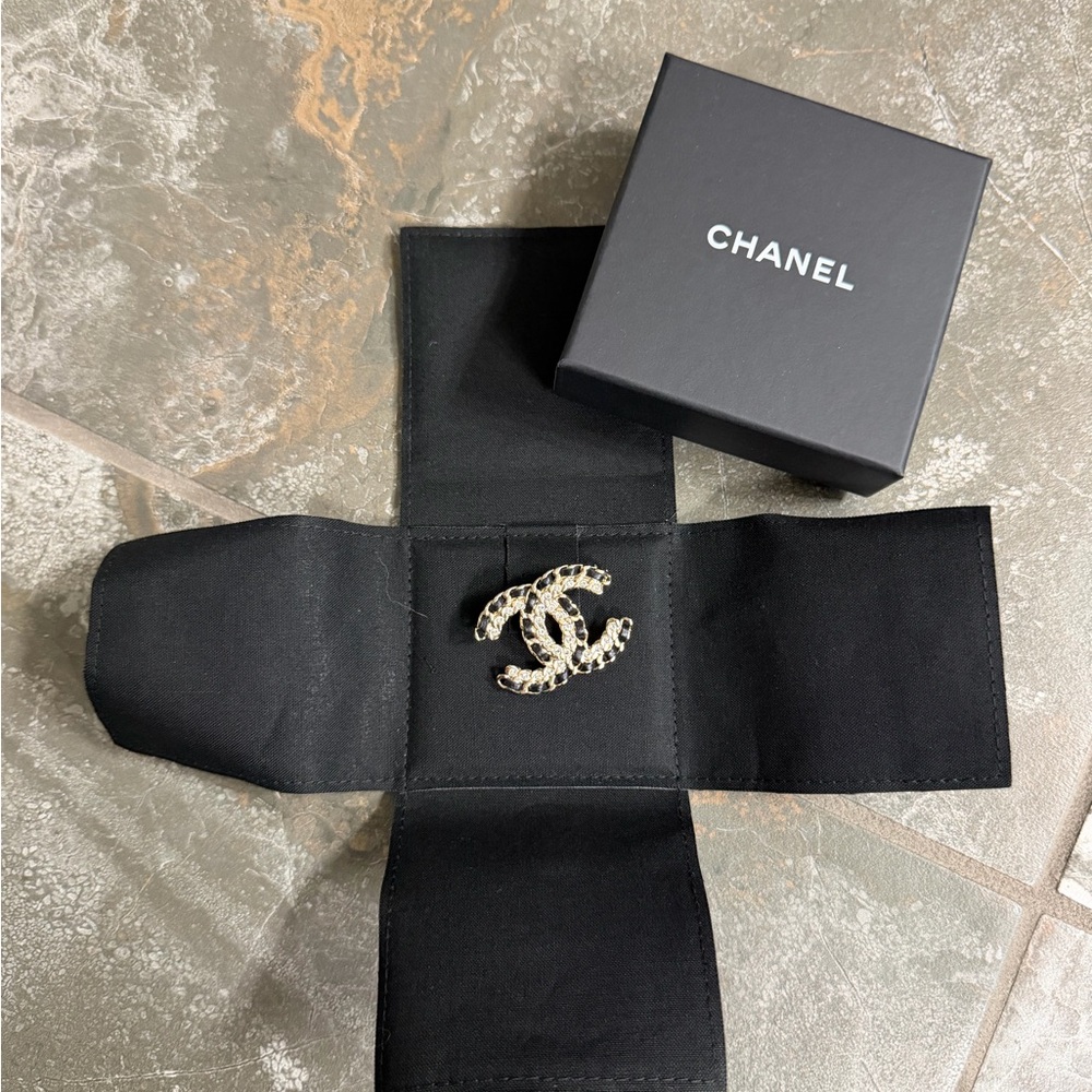 CHANEL Black and Gold Crystal Brooch Pin